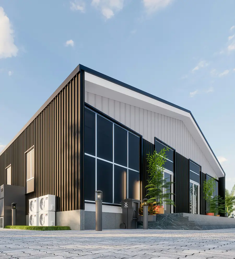 Modern industrial-style commercial building with black vertical metal siding, large windows, and a white roof trim.